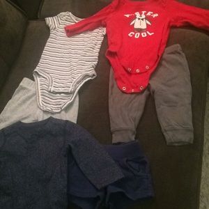 2 Pants, 1 shorts, 3 onesies size 3 to 6 month